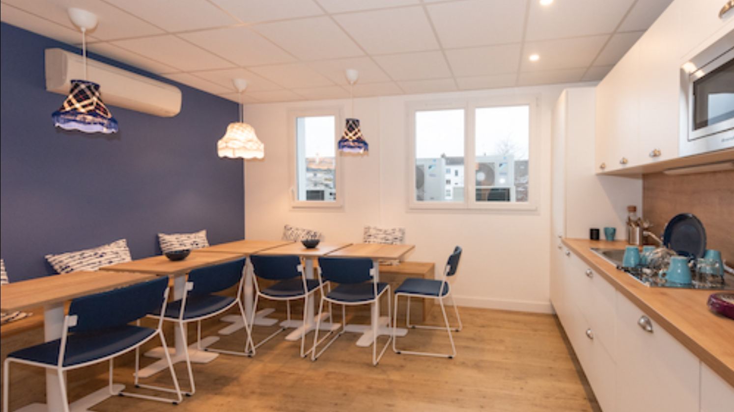 espace cuisine partagee et salle a manger amenagee gestion nantes energie batiment 16x9